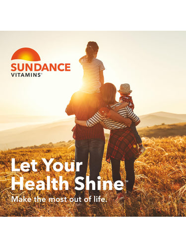 A family of four, two adults and two children, watching the sunset in a golden field. Sundance Vitamins logo.