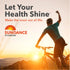 Adult male cyclist on a mountain bike, arm raised in triumph at sunset, with Sundance Vitamins logo visible.