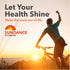 A man cycles at sunset, raising his arm in triumph, promoting Sundance Vitamins.