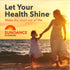 Woman and young girl walk hand-in-hand on a sandy beach at sunset, with 'Sundance Vitamins' logo visible.