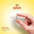 A hand holds a 3/4 inch caplet. Text reads: 60 CAPLETS. HOW TO TAKE: Take three caplets twice daily.