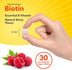 Round speckled Biotin tablet, 5/16 inches, held between fingers.