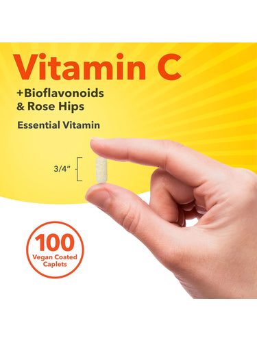 A 3/4 inch long vegan coated caplet held between fingers.