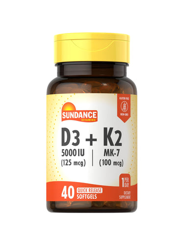 Hand holding Quick Release Softgels with 5000 IU D3 (125 mcg) and 100 mcg MK-7 K2.