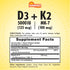 Softgel with Vitamin D 125 mcg (5,000 IU) and Vitamin K-2 100 mcg, shown in a hand for scale.