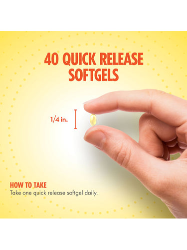 A hand holds a quick-release softgel, measuring 1/4 inch.