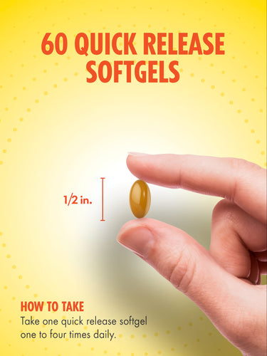 A softgel capsule measures half an inch on a hand-held scale.